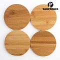 Set 4 sottobottiglie in legno dalla forma rotonda, diametro 10 cm
